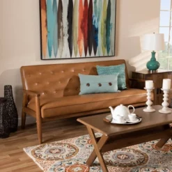 Sorrento Mid-Century Faux Leather Upholstered Wood Sofa Walnut/Brown - Baxton Studio -Outlet Baxton Studio Store GUEST 648b45d3 f98c 4ef5 833e ba2e9d1477c5